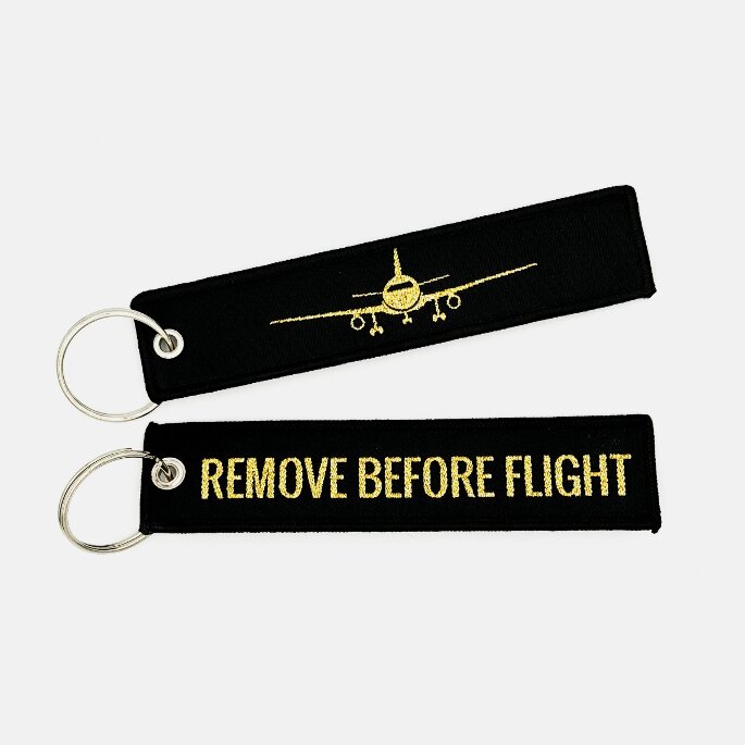 Zawieszka Remove before flight złoty samolot